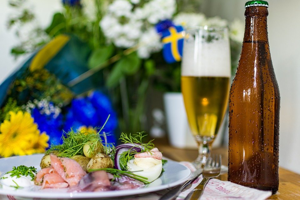 sweden midsummer celebration national holiday permanent residency